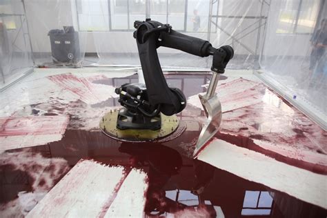 robot art piece hydraulic fluid|industrial robot continuously sweeps blood